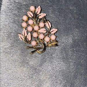Gold toned pin with pink enamel flowers